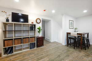 Living room featuring recessed lighting and light wood finished floors