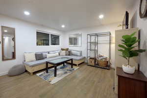 Living area featuring recessed lighting and wood finished floors