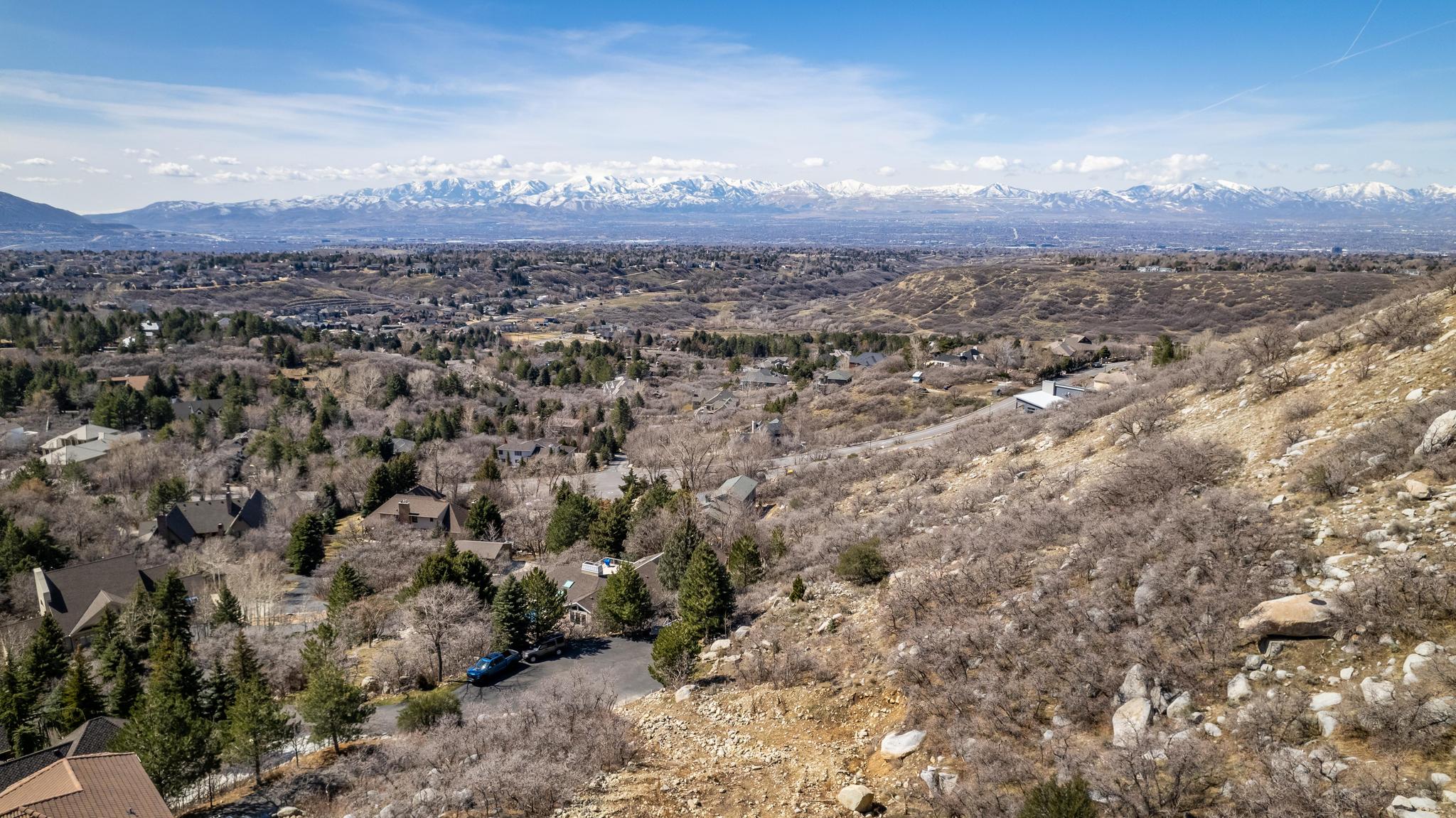Birds eye view of property featuring a mountain view