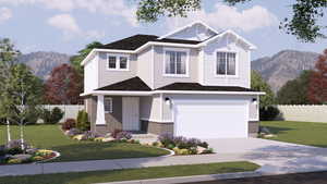 Craftsman inspired home with a front yard, a mountain view, a garage, and fence
