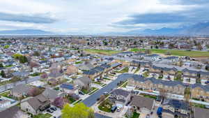 Drone / aerial view featuring a mountain view and a residential view