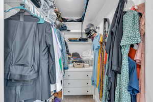 Spacious walk-in closet in the master bedroom.