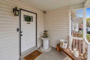 Property entrance with a porch