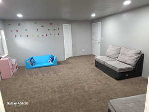 Game room featuring carpet flooring and recessed lighting