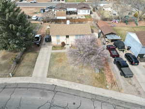 Birds eye view of property with a residential view