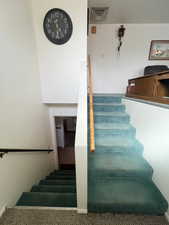Stairs featuring visible vents