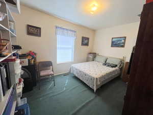 Bedroom featuring carpet flooring and visible vents