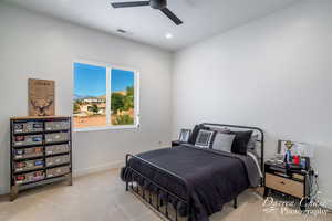 Bedroom with recessed lighting, carpet, baseboards, ceiling fan, and visible vents