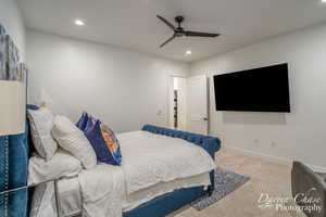 Bedroom with baseboards, a ceiling fan, recessed lighting, and carpet