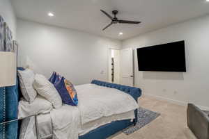 Bedroom featuring carpet flooring, a ceiling fan, and recessed lighting