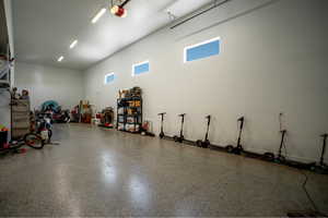 Garage featuring a garage door opener