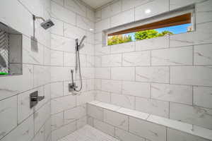 Bathroom with a tile shower
