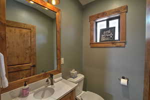 Bathroom featuring toilet and vanity