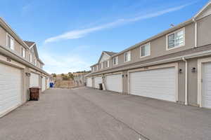 View of street featuring community garages