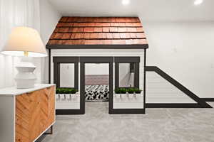 Play room, carpet floors and recessed lighting