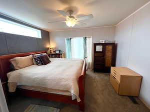 Well lit comfy master bedroom