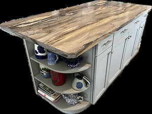 Custom island with shelving, cabinets and drawers