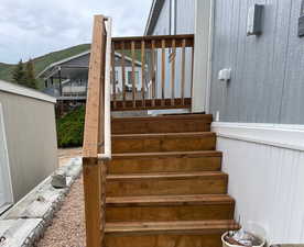Back steps to parking area and shed