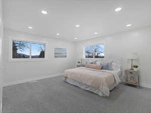 Bedroom featuring baseboards, carpet floors, and recessed lighting