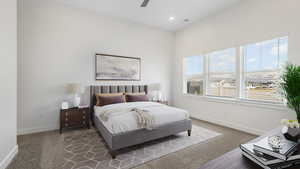 Primary bedroom with private en suite and walk in closet. *virtually staged