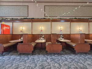 Living area featuring carpet flooring