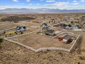 Birds eye view of property featuring a mountain view and a rural view