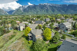 Aerial view of residential area with a mountainous background