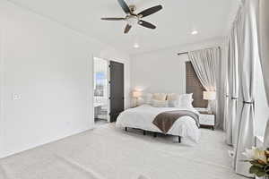 Bedroom with connected bathroom, light carpet, baseboards, ceiling fan, and recessed lighting