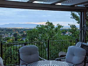 Pergola seating area with mountain views.