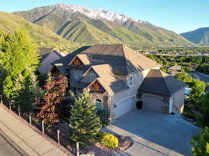 Birds eye view of property with a mountain view