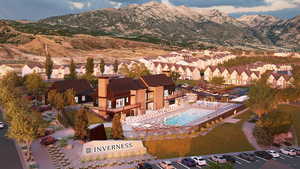 Drone / aerial view featuring a mountain view and a residential view