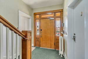 Common Space - Shared Entryway with mailboxes and basement access.
