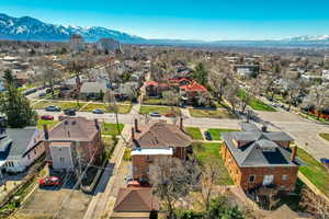 Birds eye view of property with a residential view and a mountain view