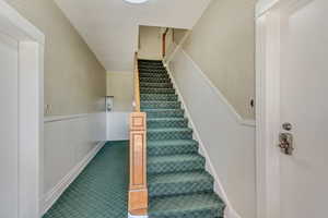 Shared Stairwell to Units 2, 3, 4, 5 and 6 and access to Unit 1 and basement with Shared Laundry and storage.