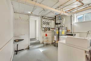 Shared Laundry and Basement access from East side of home/Alleyway.