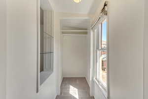 Unit 5 - Closet - East Facing with pass through shelving into Bedroom