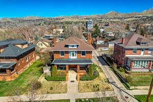 Birds eye view of property featuring a residential view and a mountain view
