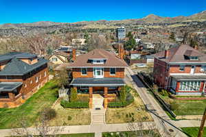 Drone / aerial view featuring a residential view and a mountain view
