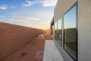 View of property exterior with a fenced backyard