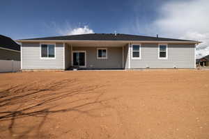 Back of house featuring fence