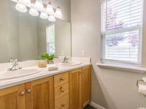master Full bathroom with a sink and double vanity