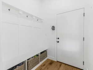 Mudroom featuring light wood-style floors