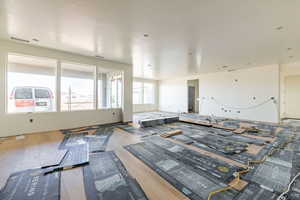 Interior space featuring visible vents and wood finished floors
