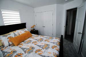 Bedroom featuring a closet and carpet
