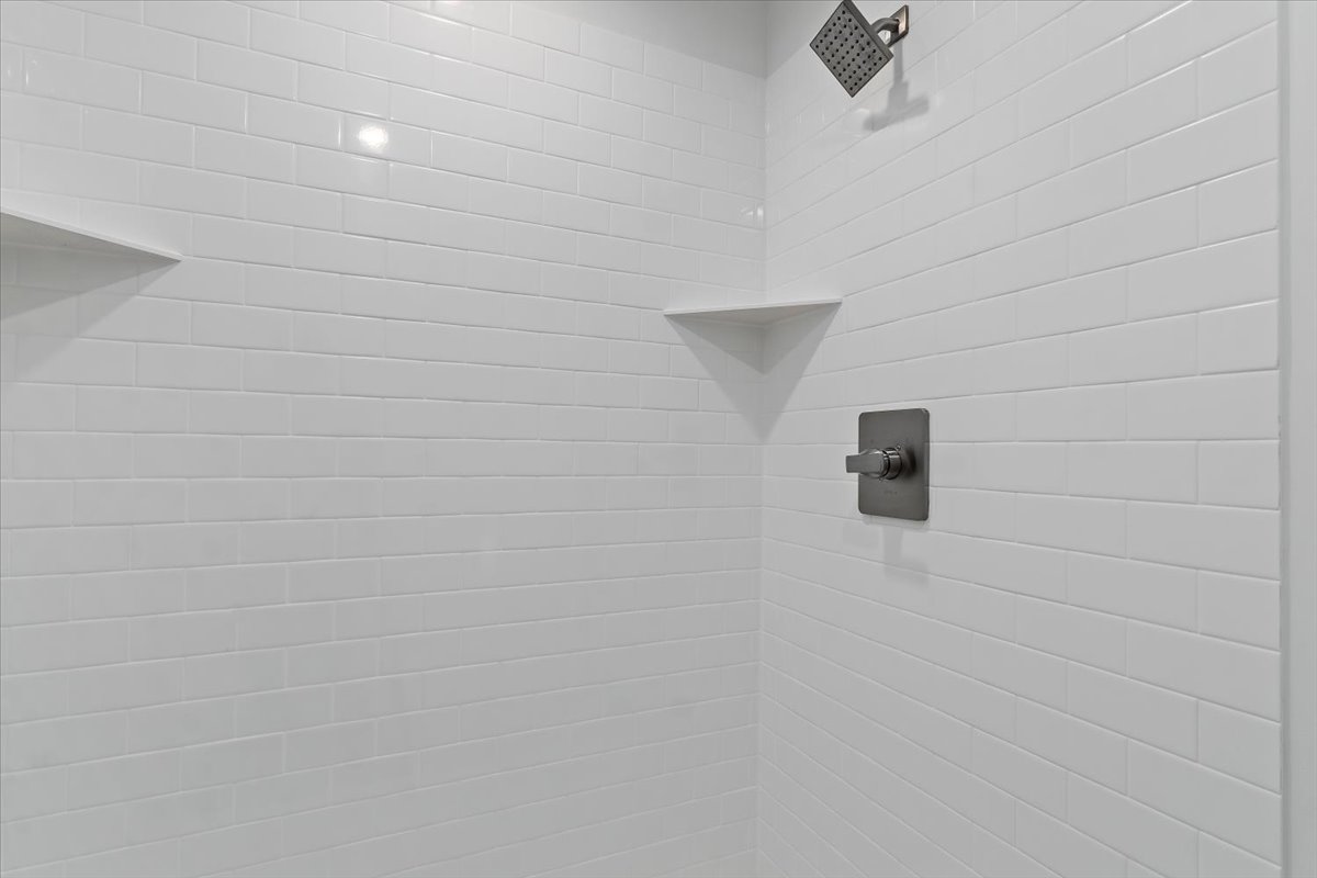 Details featuring tiled shower