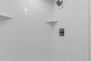 Details featuring tiled shower