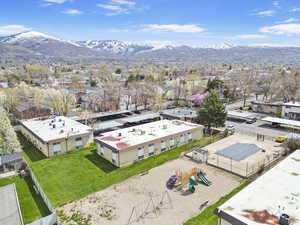 Aerial view featuring a mountain view and a residential view