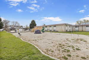 Exterior space with playground community and fence
