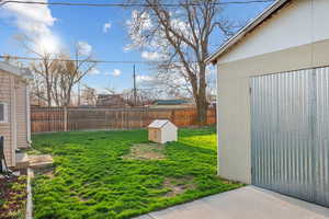 View of yard featuring a fenced backyard
