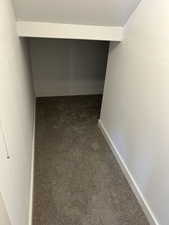 under stairs continues around corner
